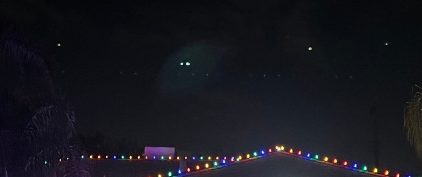 Christmas light service in Auburn, CA: multicolor c9 roofline run hip roof